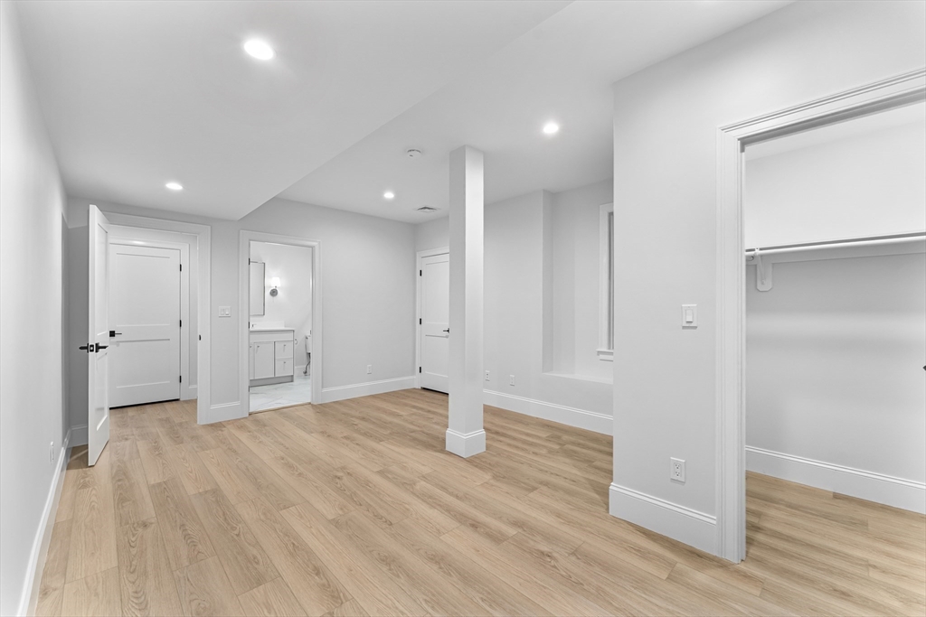 126 Prince Street Needham, MA 02492 - Photo 22 of 26 a view of empty room with wooden floor