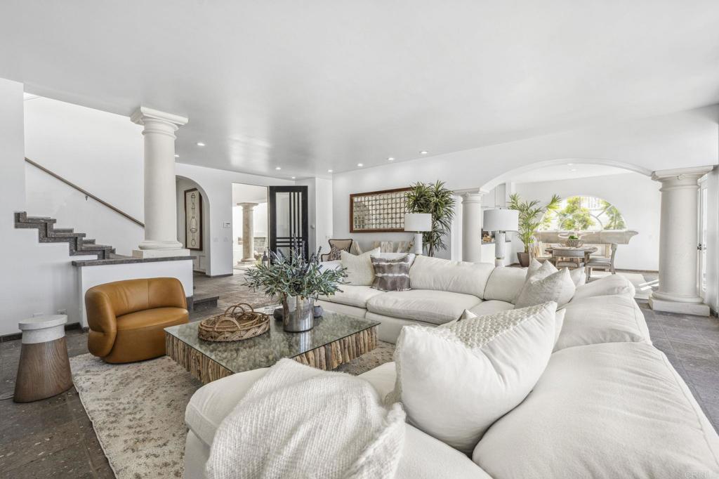 1716 Ocean Front Del Mar, CA 92014 - Photo 12 of 61 a living room with furniture and a large window