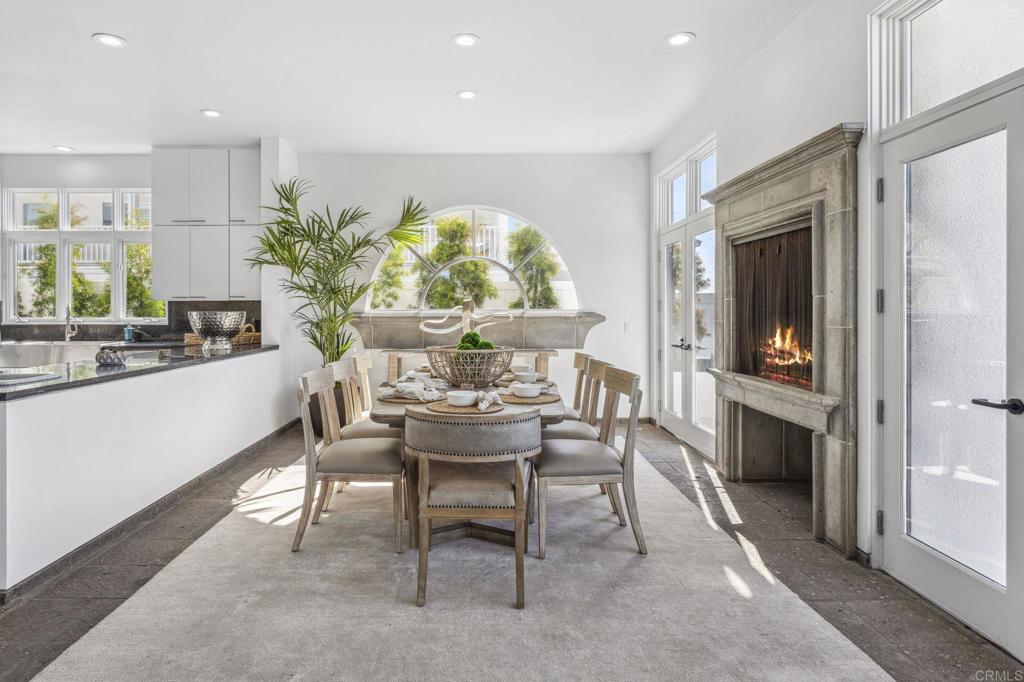 1716 Ocean Front Del Mar, CA 92014 - Photo 13 of 61 a dining room with furniture and window