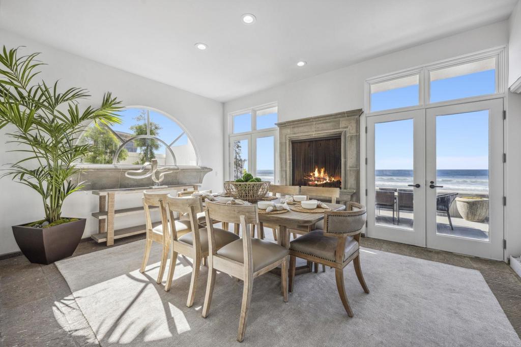 1716 Ocean Front Del Mar, CA 92014 - Photo 14 of 61 a view of a dining room with furniture window and outside view