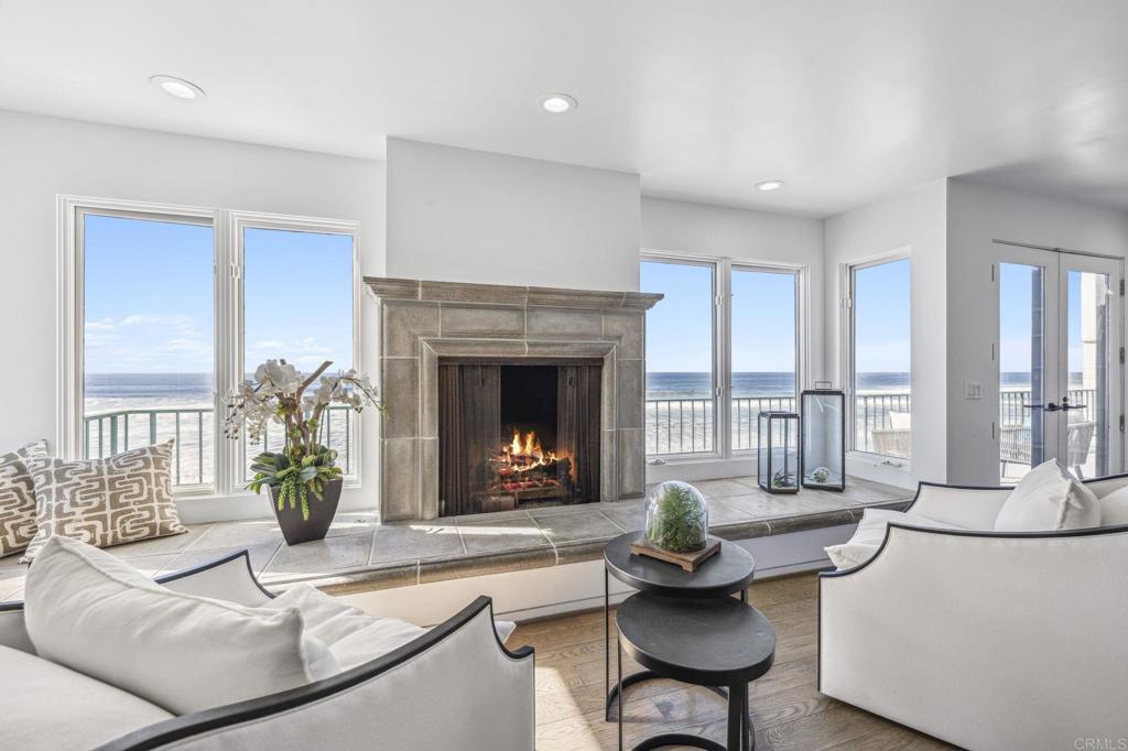 1716 Ocean Front Del Mar, CA 92014 - Photo 26 of 61 a living room with furniture and a fireplace