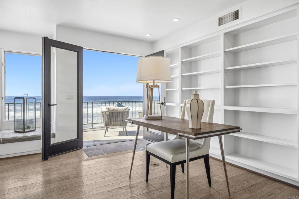 1716 Ocean Front Del Mar, CA 92014 - Photo 27 of 61 a dining room with furniture and wooden floor