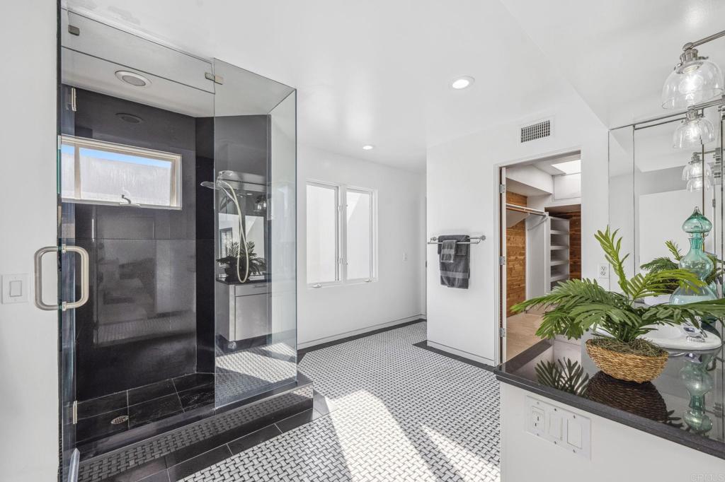 1716 Ocean Front Del Mar, CA 92014 - Photo 35 of 61 a room with granite countertop a refrigerator and a sink