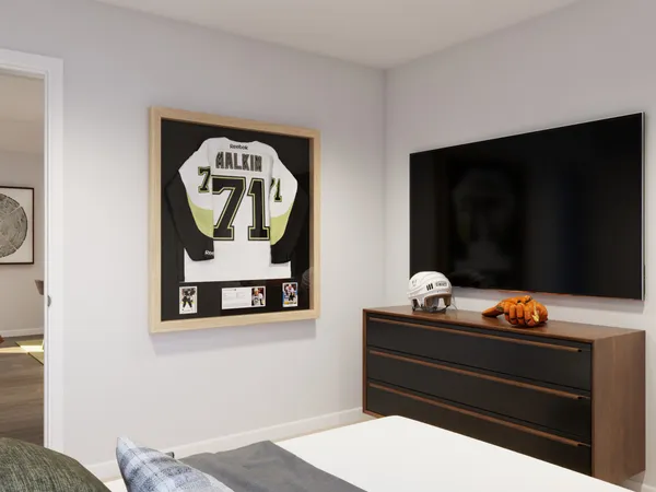 a view of a brick house with a large trees