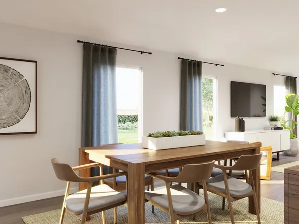 a bedroom with a bed and a television