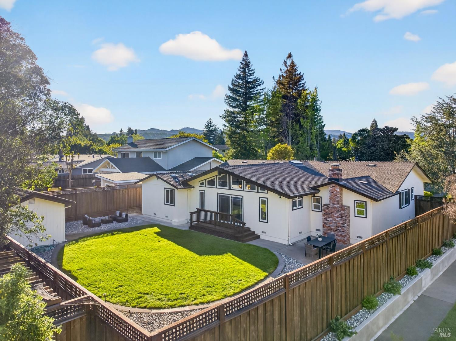 2447 Rigdon Street Napa, CA 94558 - Photo 76 of 79 a view of a house with a swimming pool and a yard