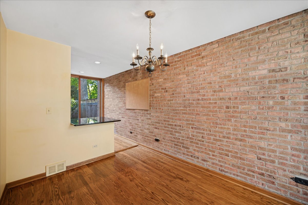 471 Linden Street Winnetka, IL 60093 - Photo 26 of 36 a bathroom with a sink and a mirror