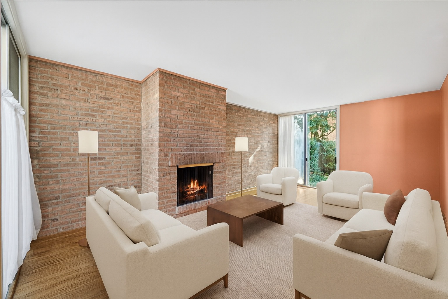 471 Linden Street Winnetka, IL 60093 - Photo 3 of 36 a living room with furniture and a fireplace