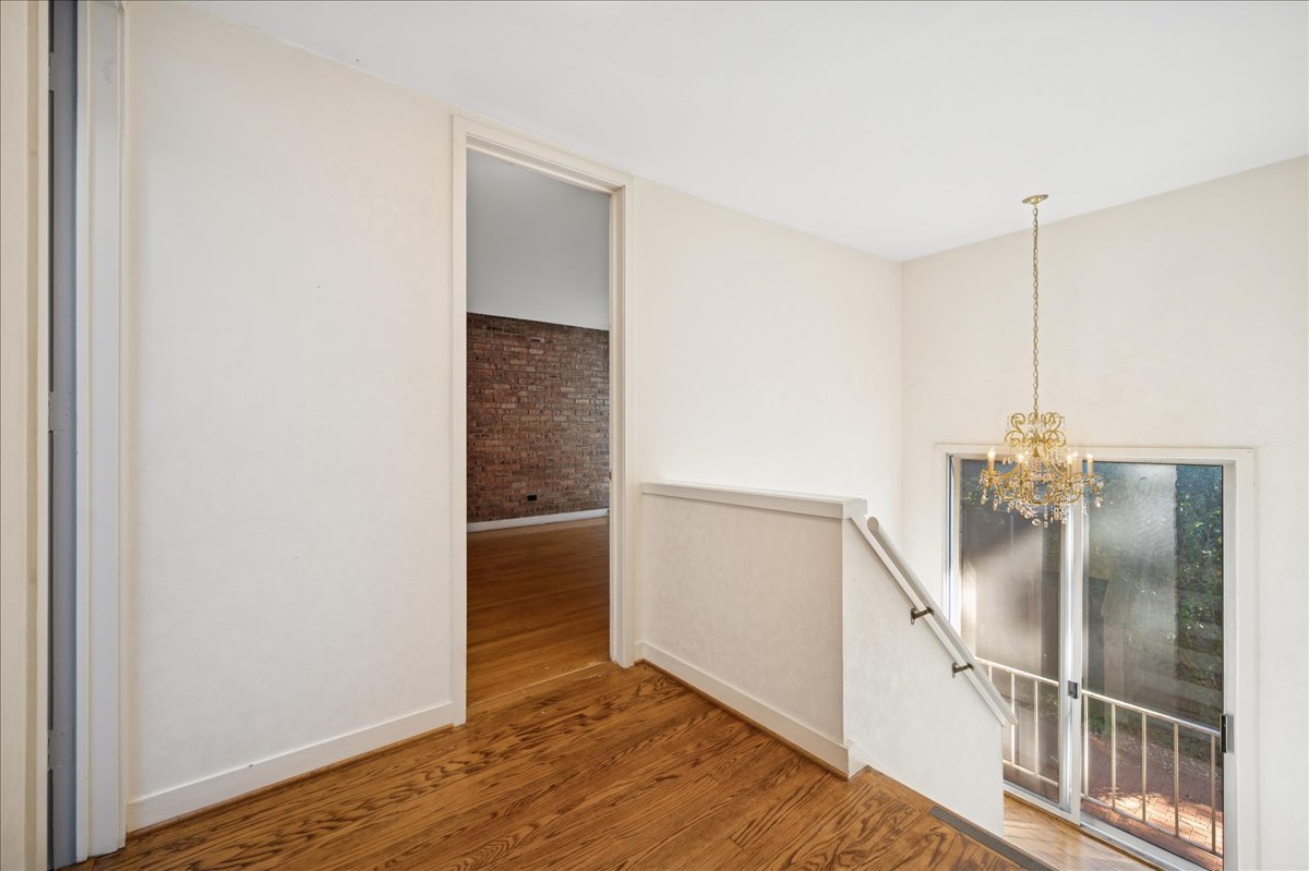 471 Linden Street Winnetka, IL 60093 - Photo 10 of 36 a view of entryway and hall with wooden floor