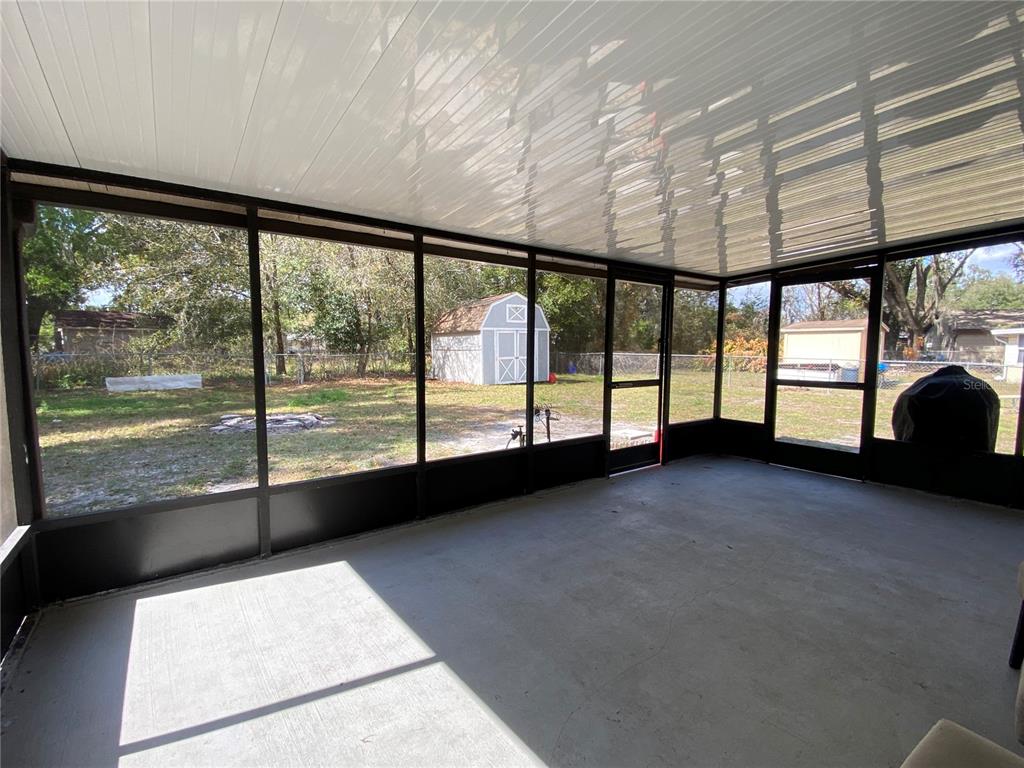 39656 Meadowood Loop Zephyrhills, FL 33542 - Photo 24 of 30 a view of an empty room with a large window