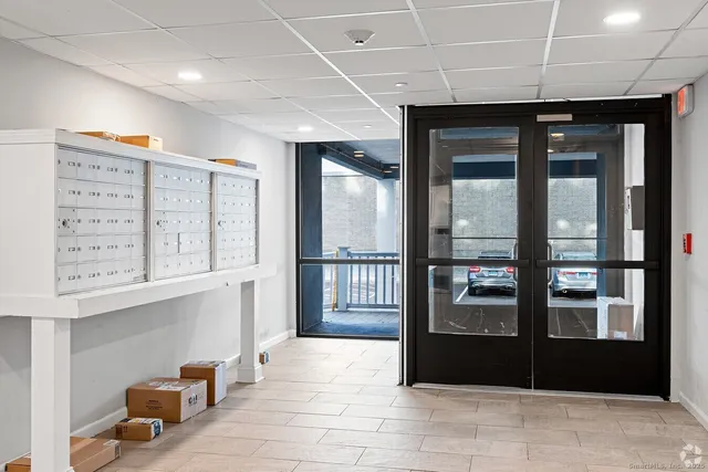 a view of a hallway with windows