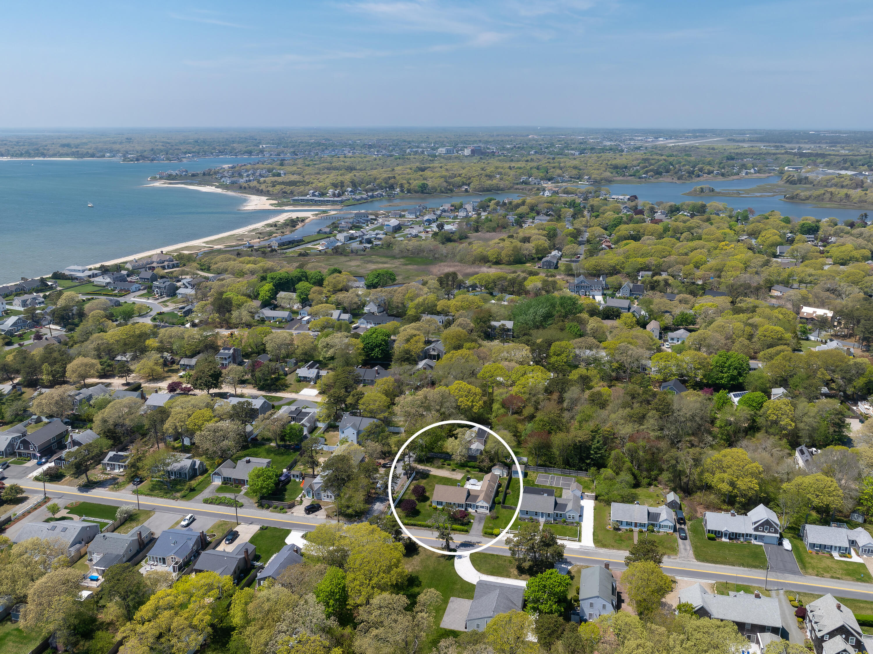 111 Lewis Road West Yarmouth, MA 02673 - Photo 28 of 43 an aerial view of a residential houses with outdoor space and ocean view