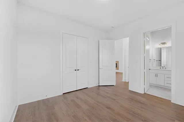 a bathroom with a shower sink and mirror