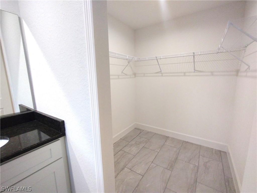 527 David Circle LaBelle, FL 33935 - Photo 15 of 35 a view of a kitchen with cabinets