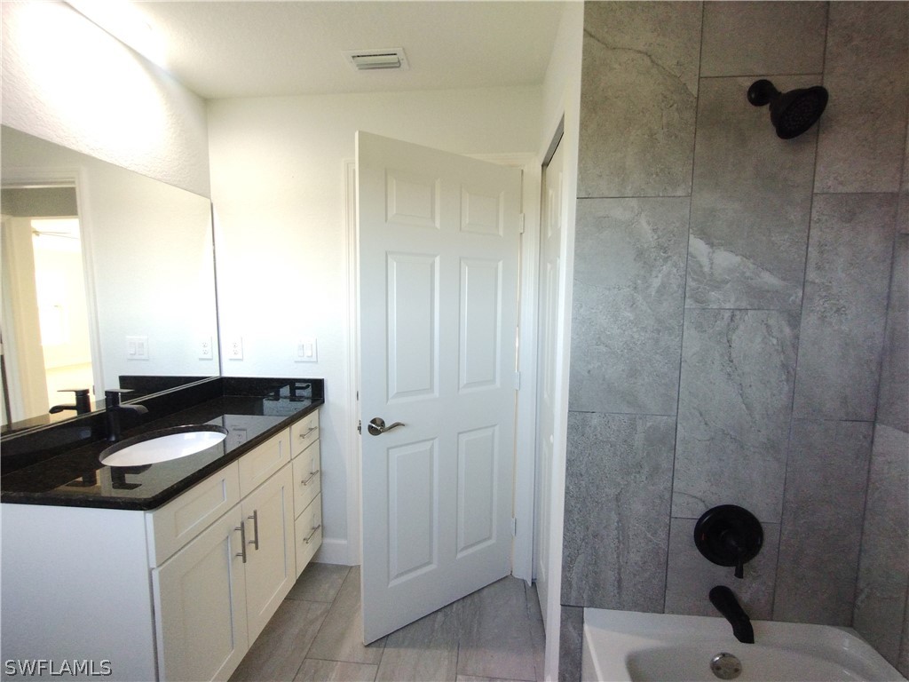 527 David Circle LaBelle, FL 33935 - Photo 25 of 35 a kitchen with a sink and a stove