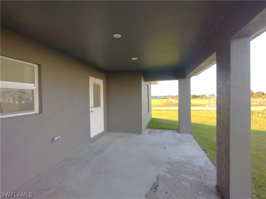 527 David Circle LaBelle, FL 33935 - Photo 30 of 35 a view of an empty room with a balcony