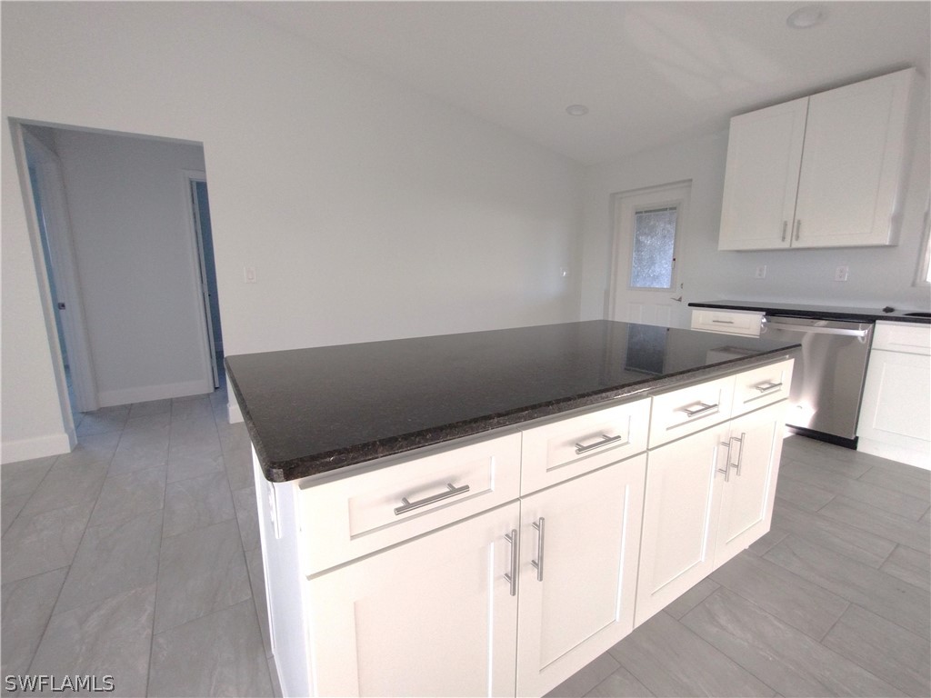 527 David Circle LaBelle, FL 33935 - Photo 8 of 35 a view of a kitchen with sink and cabinets