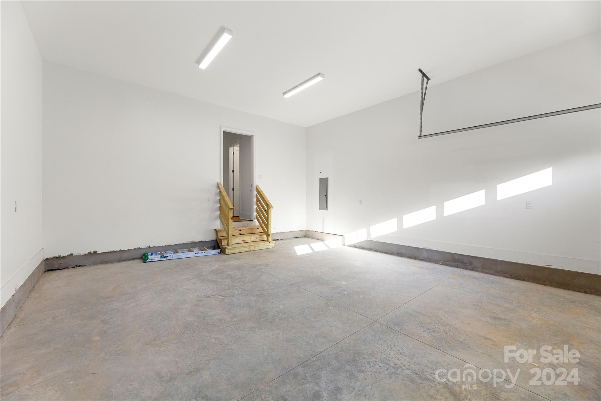 3704 Tuckaseegee Road Charlotte, NC 28208 - Photo 36 of 39 a view of a room with gym equipment