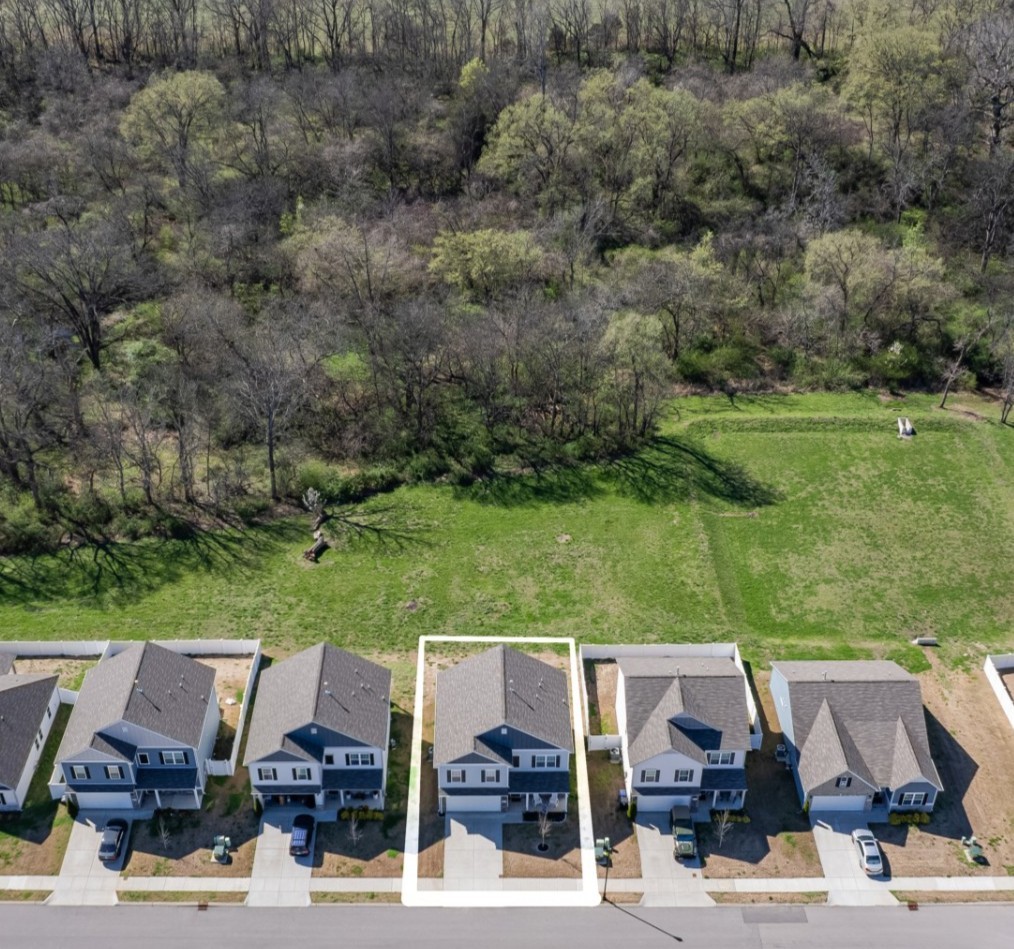 229 Stonewall Road Columbia, TN 38401 - Photo 2 of 61 an aerial view of a house with yard swimming pool and outdoor seating