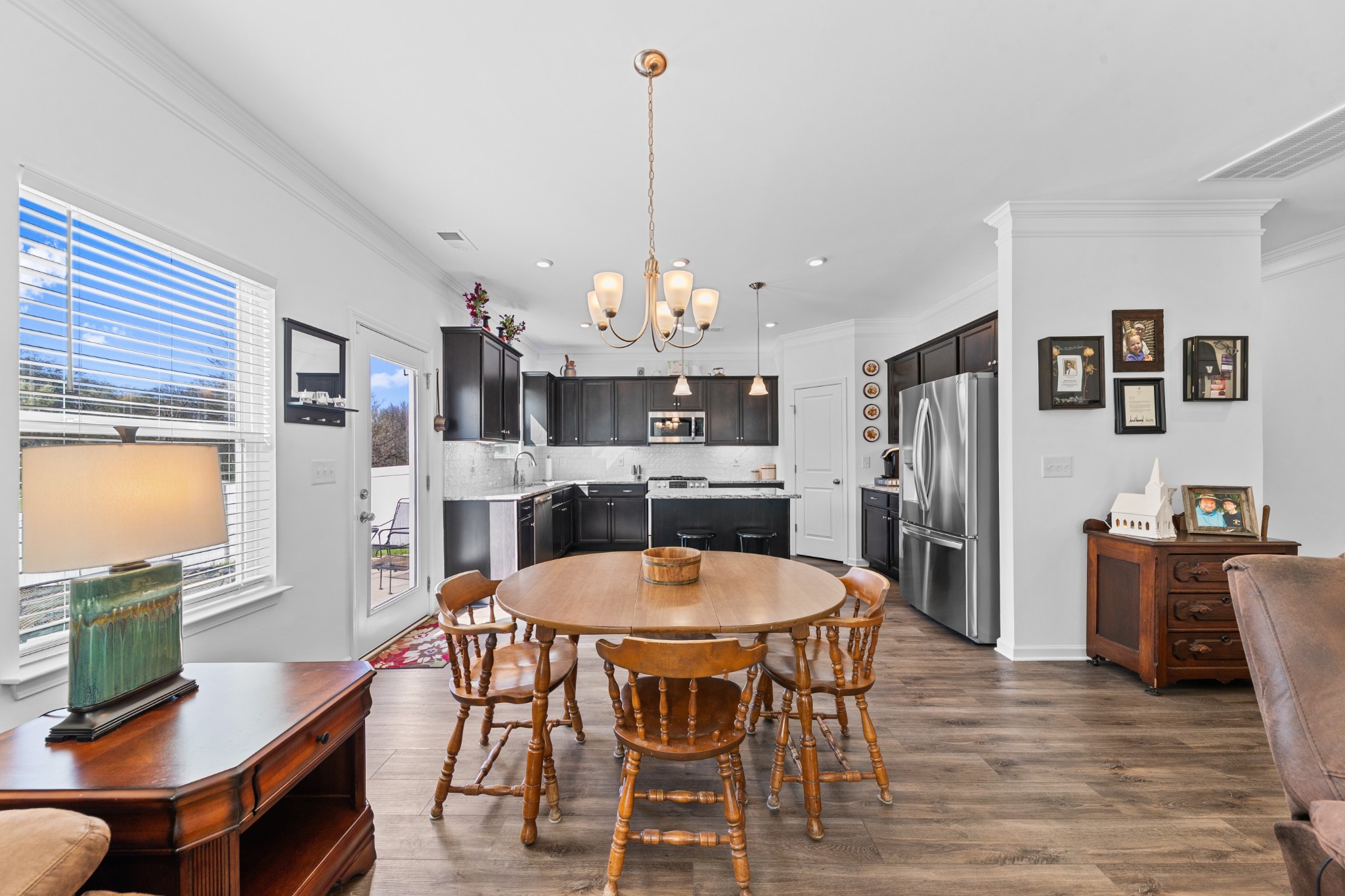 229 Stonewall Road Columbia, TN 38401 - Photo 21 of 61 a view of a dining room with furniture window and wooden floor