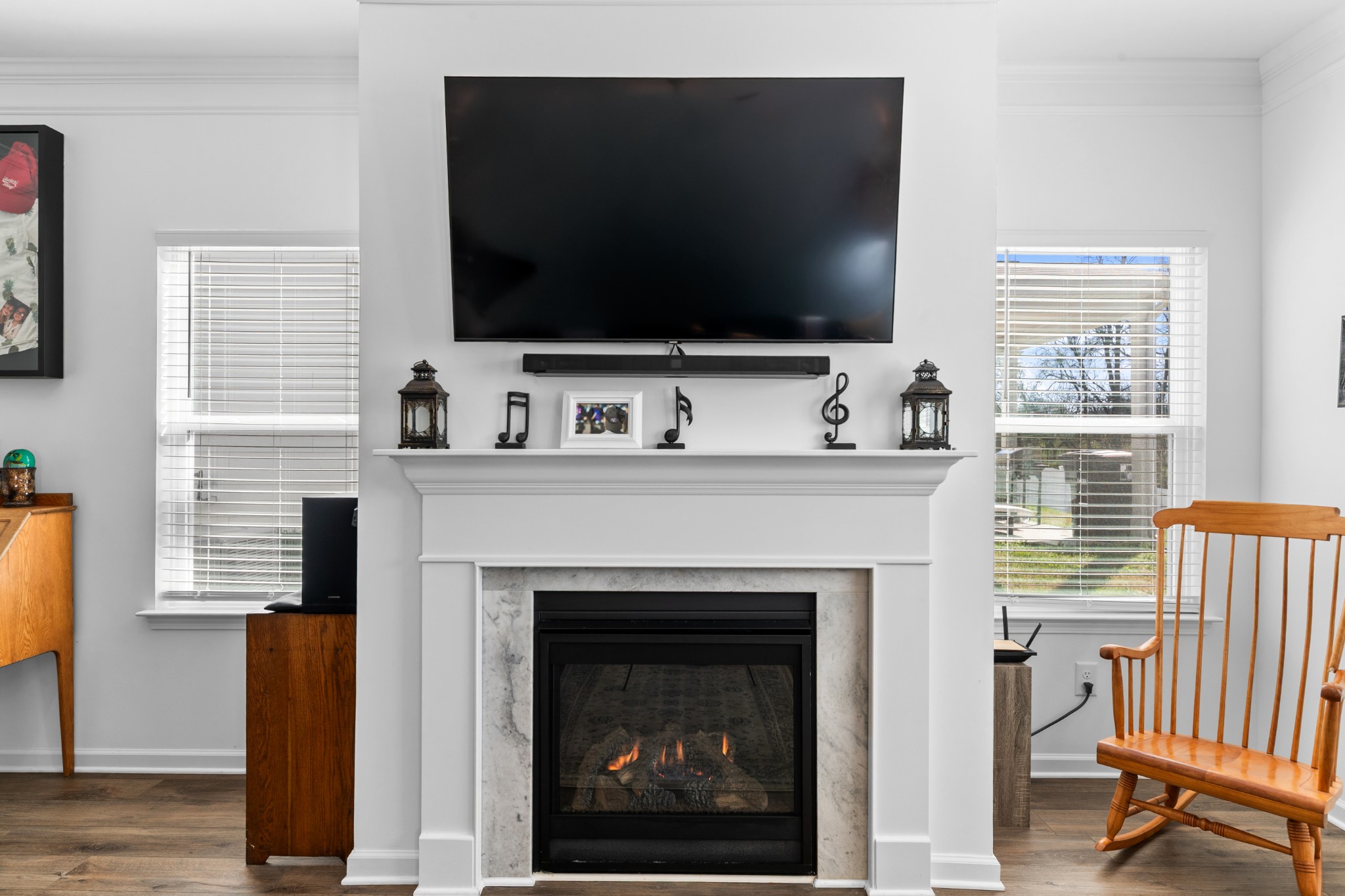 229 Stonewall Road Columbia, TN 38401 - Photo 29 of 61 a living room with a flat screen tv and a fireplace