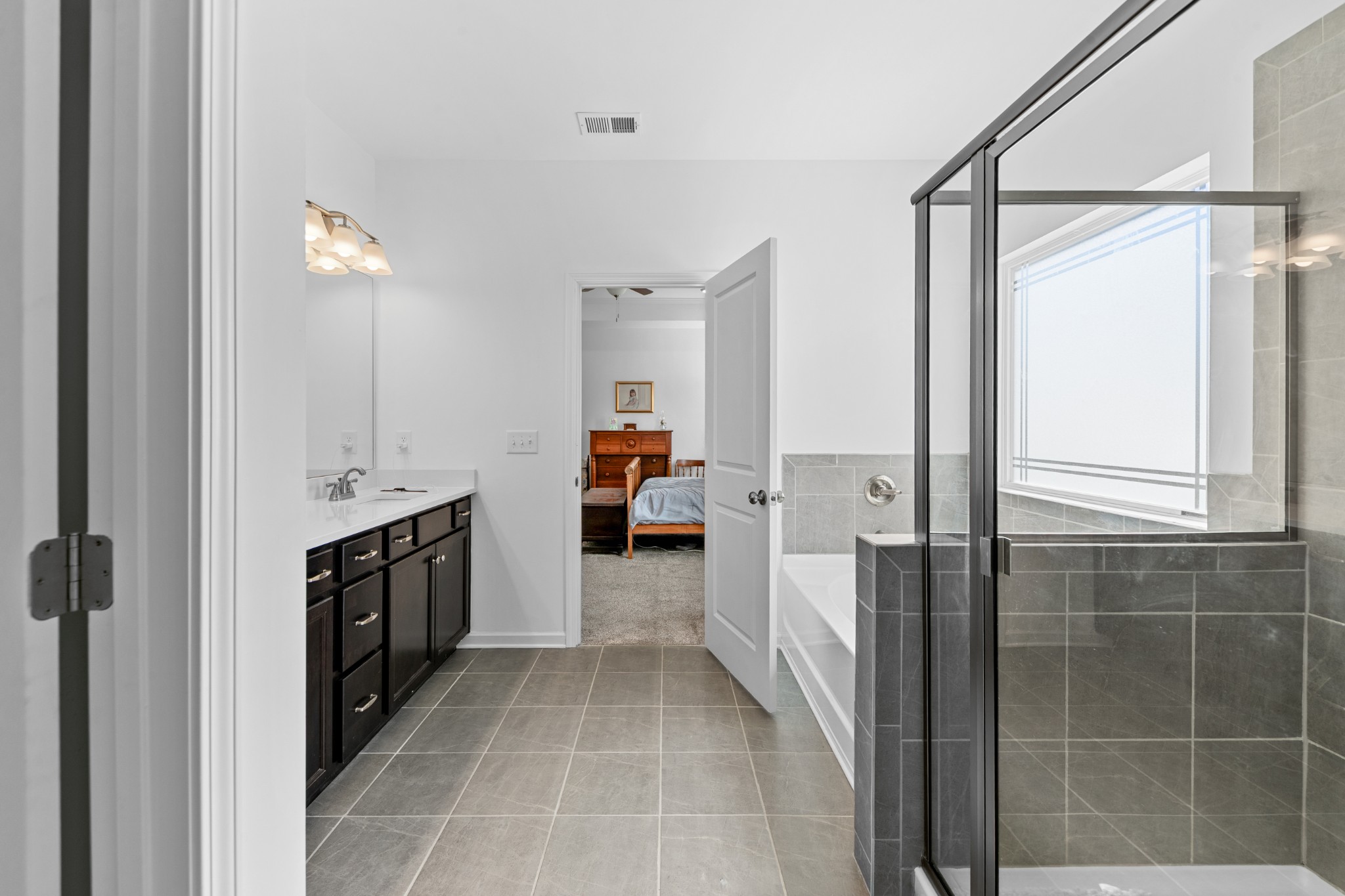 229 Stonewall Road Columbia, TN 38401 - Photo 37 of 61 a view of a kitchen with a sink and a refrigerator
