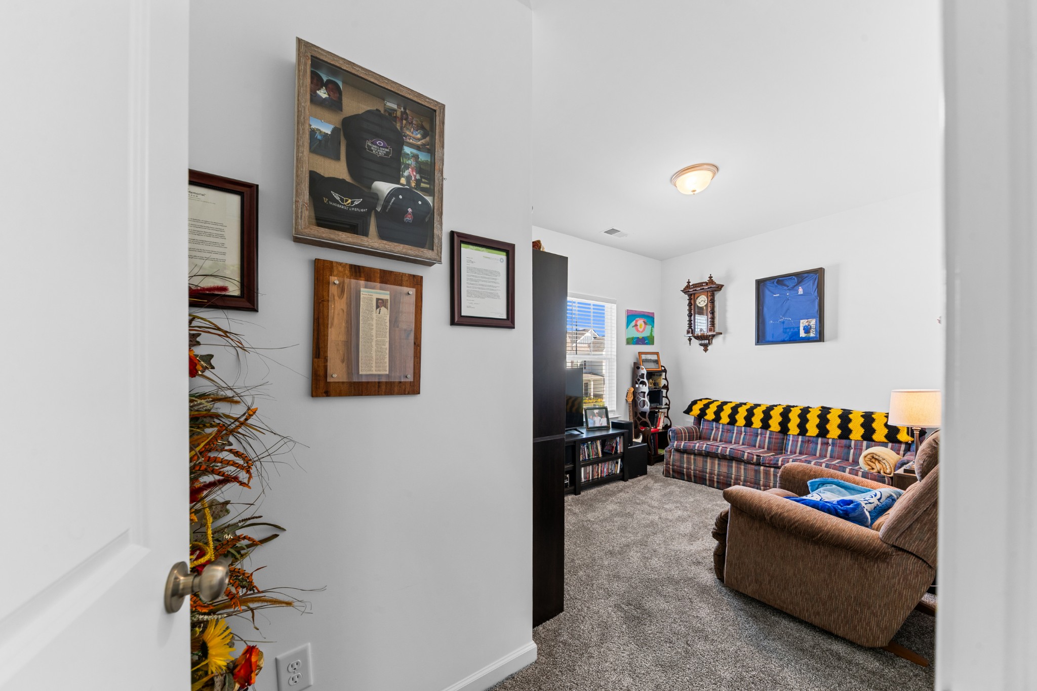 229 Stonewall Road Columbia, TN 38401 - Photo 47 of 61 a bedroom with furniture and a book shelf