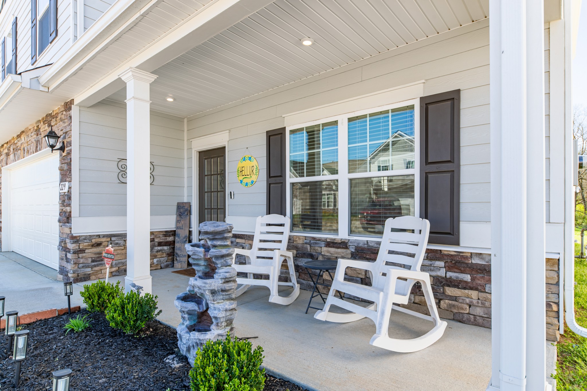 229 Stonewall Road Columbia, TN 38401 - Photo 60 of 61 a view of a patio with table and chairs and potted plants