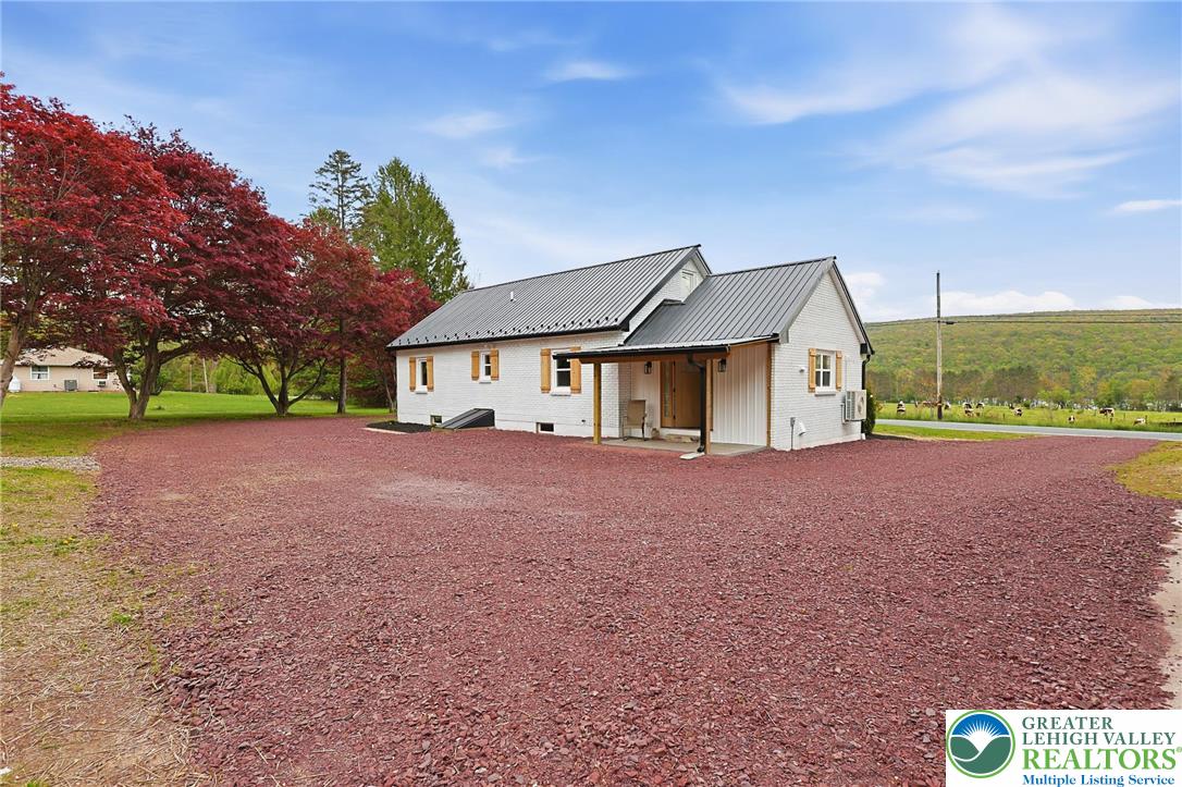 121 Ben Titus Road Tamaqua, PA 18252 - Photo 42 of 48 a view of house with backyard and garden
