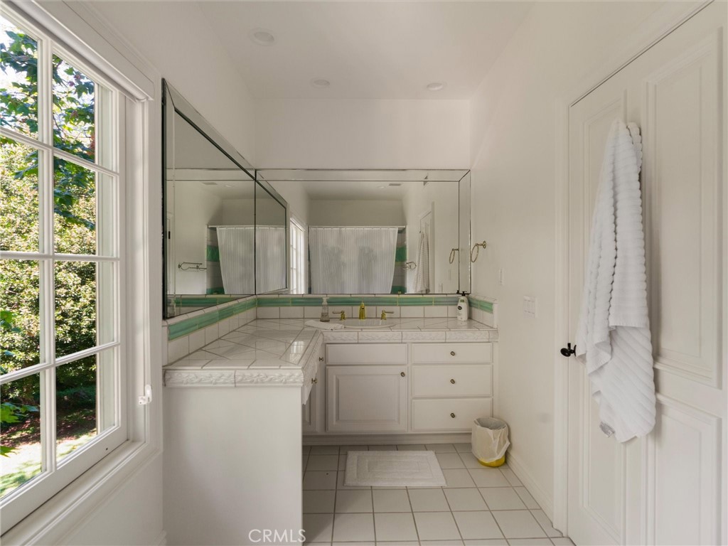 6000 Cavalleri Road Malibu, CA 90265 - Photo 37 of 44 a bathroom with a sink a toilet and shower