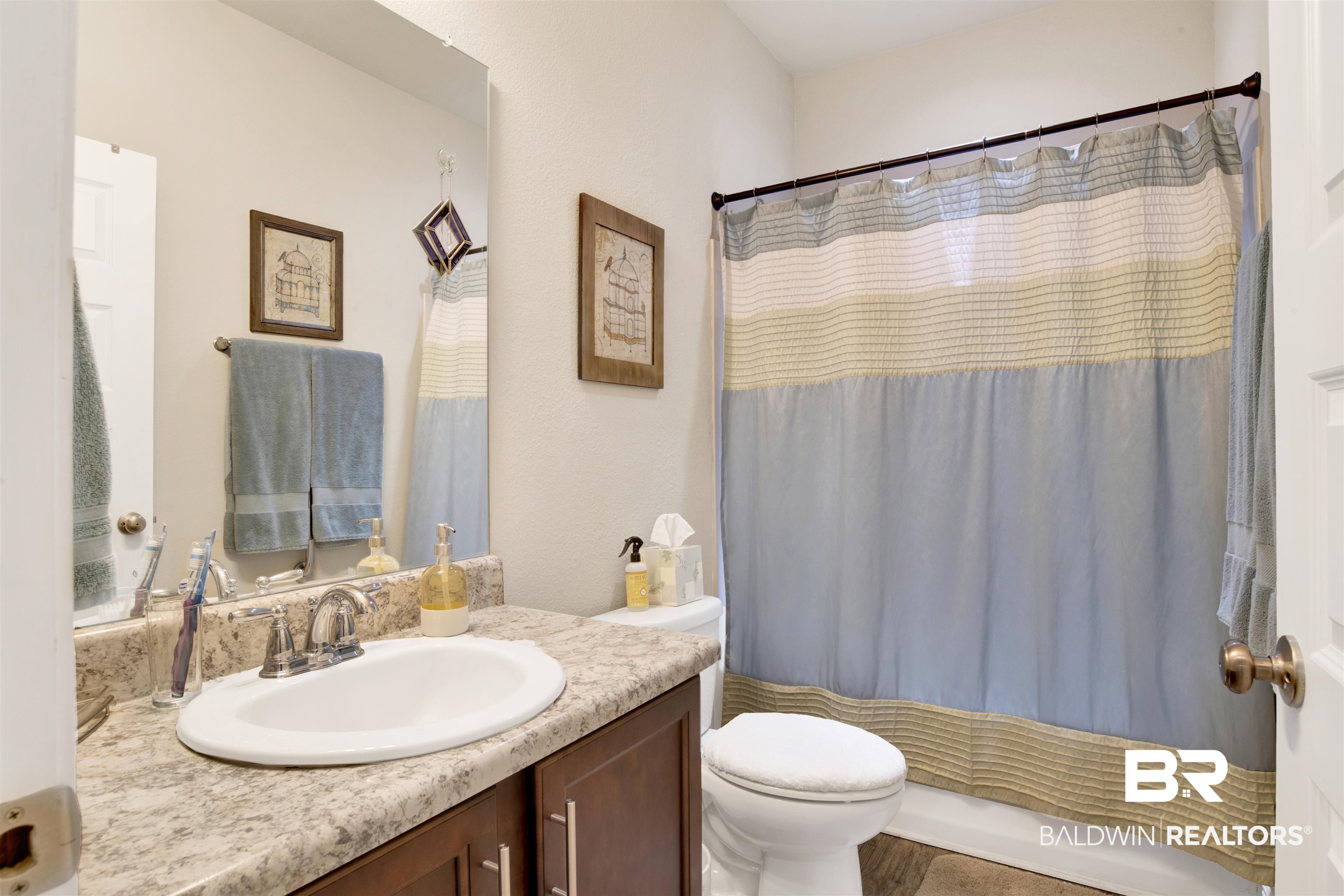 1476 Surrey Loop Foley, AL 36535 - Photo 24 of 31 Bathroom with vanity and toilet