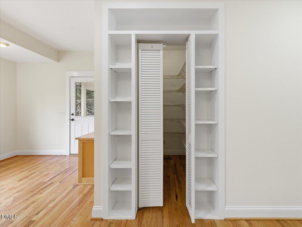 67 Bingham Ridge Drive Pittsboro, NC 27312 - Photo 19 of 82 a view of hallway with wooden floor