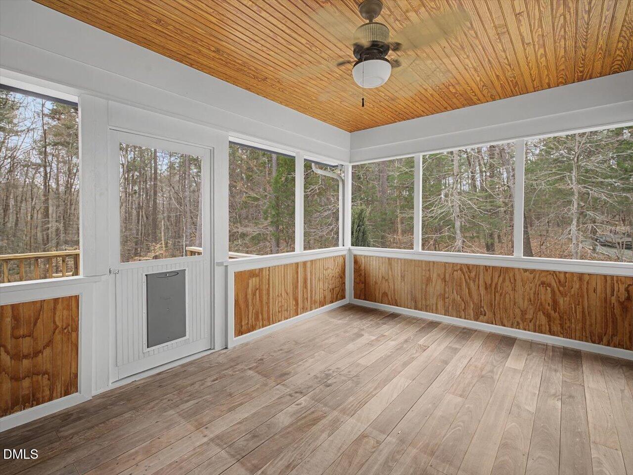 67 Bingham Ridge Drive Pittsboro, NC 27312 - Photo 25 of 82 a view of an empty room with a window and wooden floor