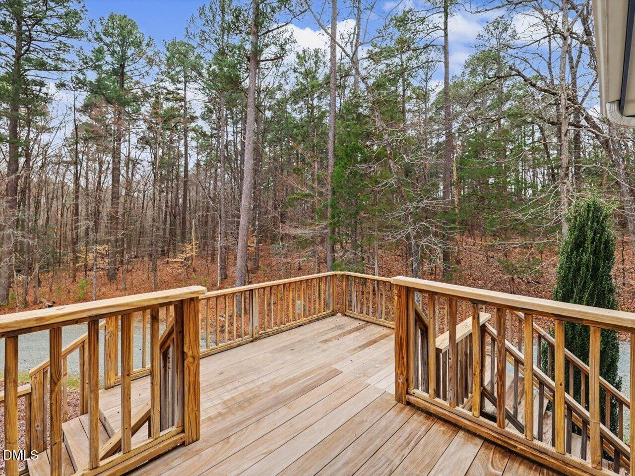 67 Bingham Ridge Drive Pittsboro, NC 27312 - Photo 28 of 82 a view of balcony with wooden floor and fence