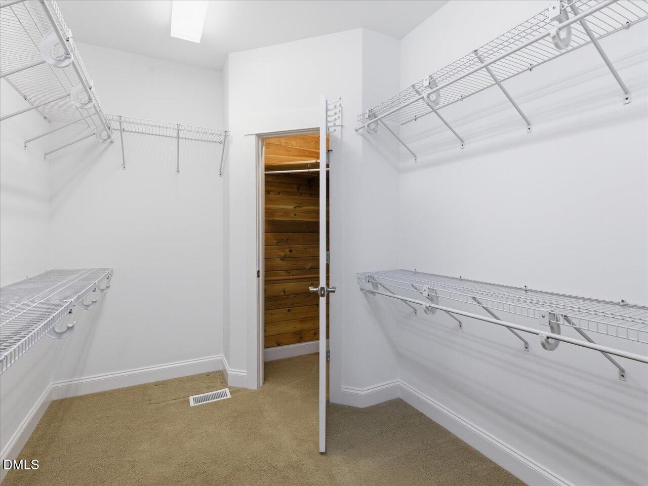 67 Bingham Ridge Drive Pittsboro, NC 27312 - Photo 45 of 82 a view of a room with racks on the wall