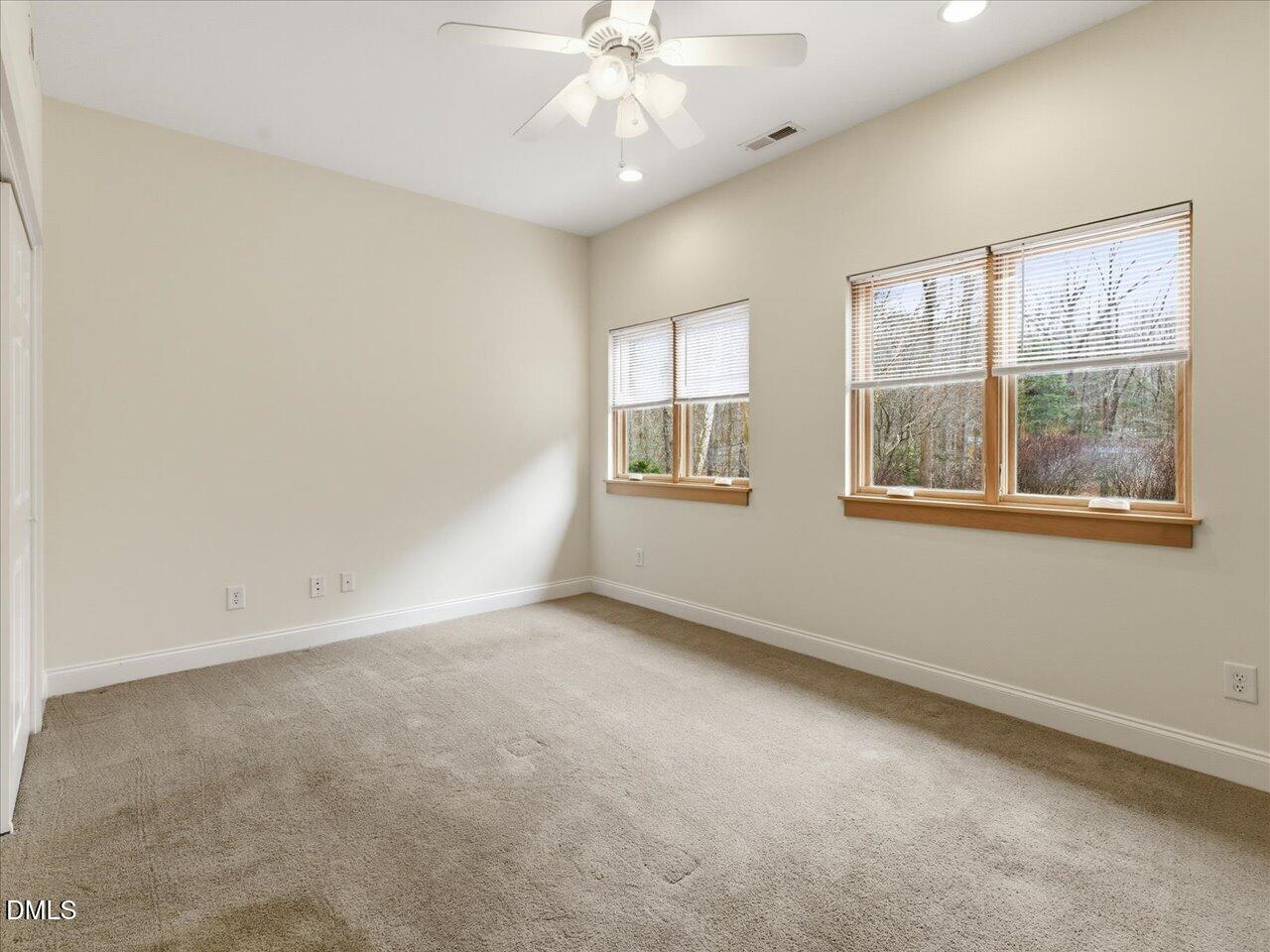 67 Bingham Ridge Drive Pittsboro, NC 27312 - Photo 58 of 82 an empty room with a window