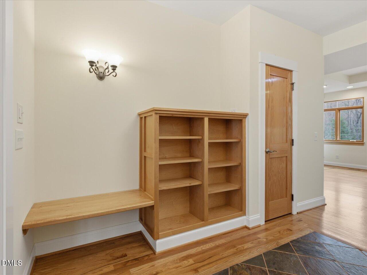 67 Bingham Ridge Drive Pittsboro, NC 27312 - Photo 6 of 82 a view of a room with wooden floor and closet