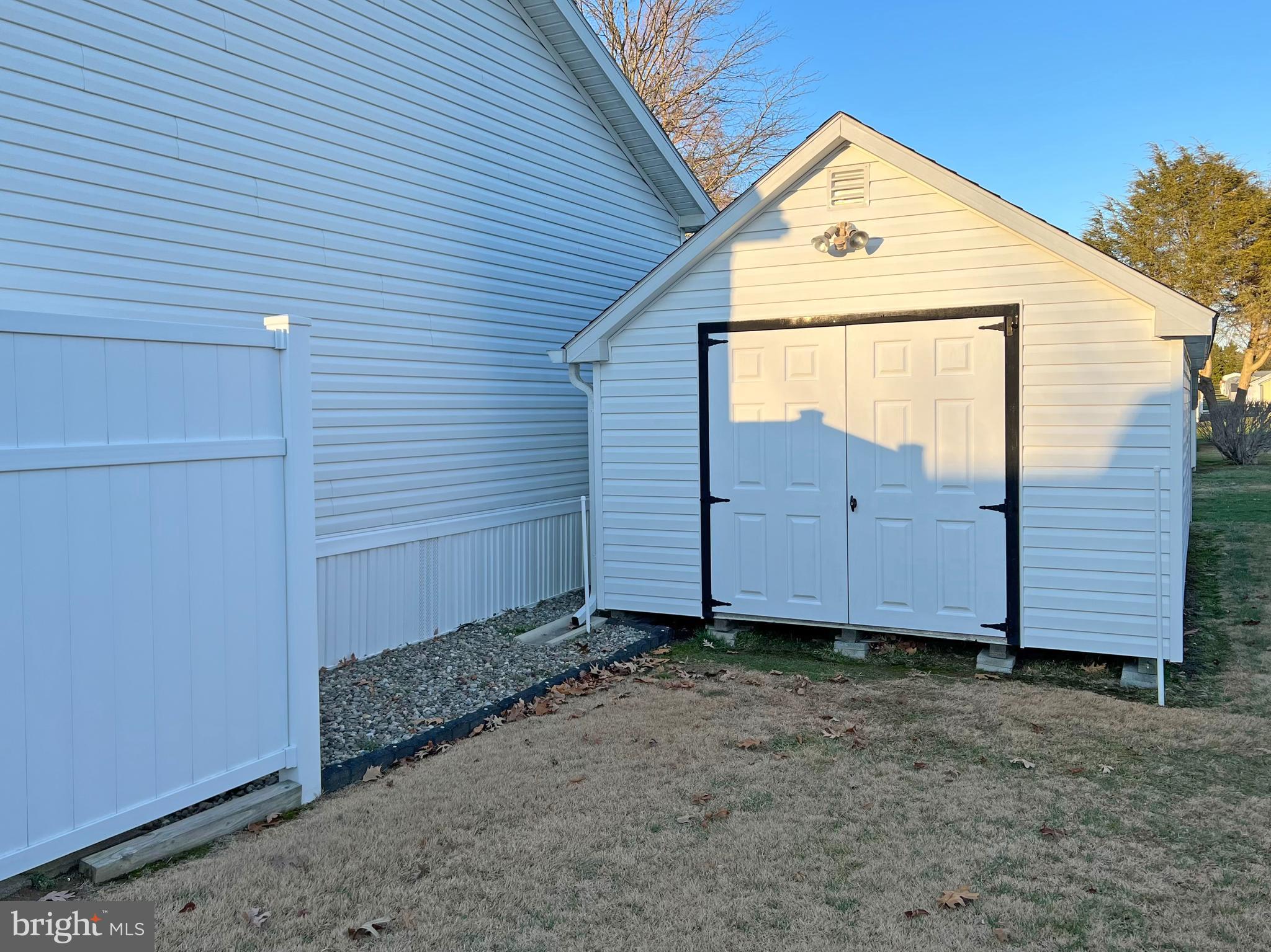 6 Baybreeze Road, Unit D6 Rehoboth Beach, DE 19971 - Photo 27 of 34 Shed's Double-Door Entry