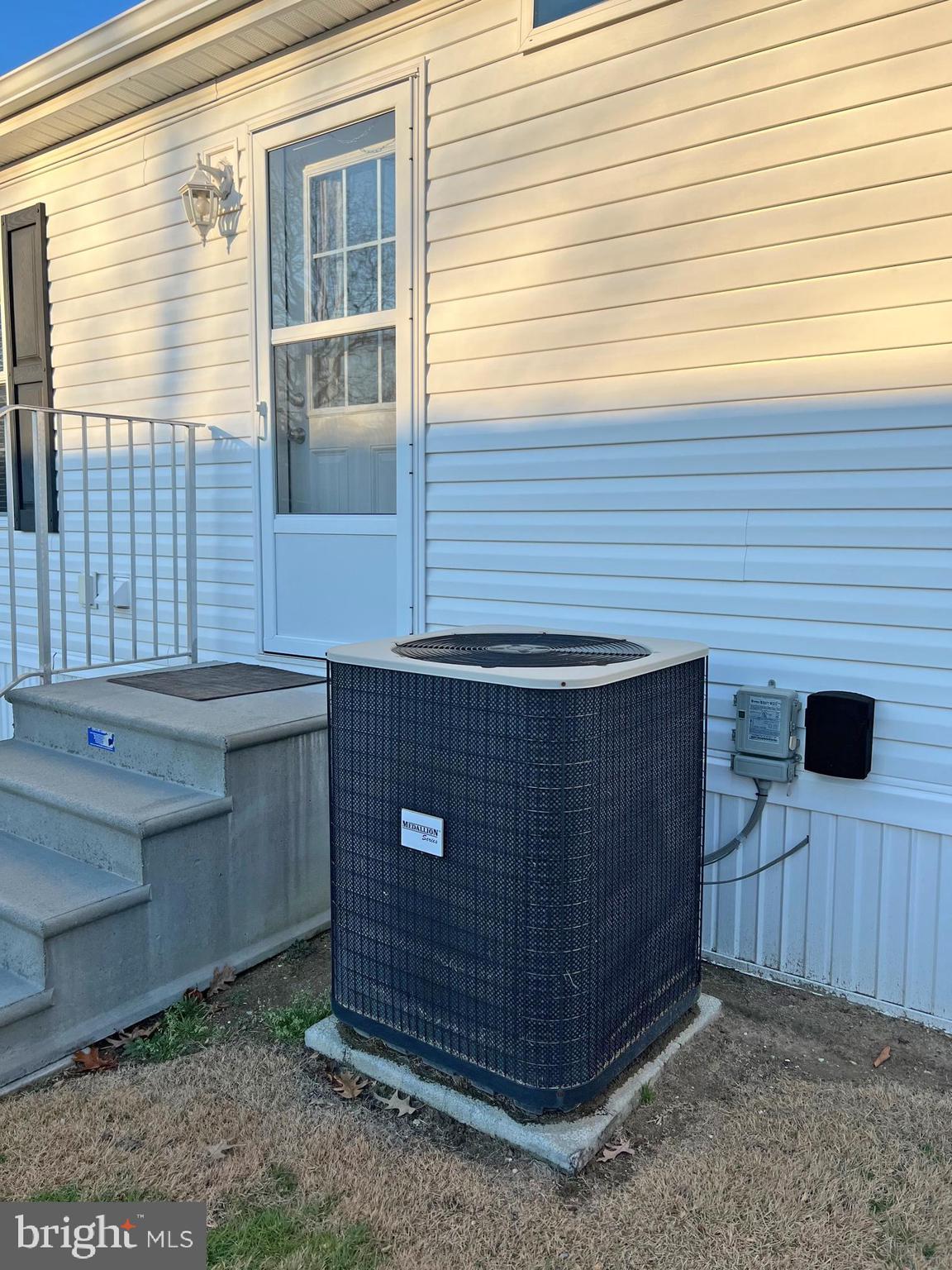 6 Baybreeze Road, Unit D6 Rehoboth Beach, DE 19971 - Photo 31 of 34 Medallion AC Condenser