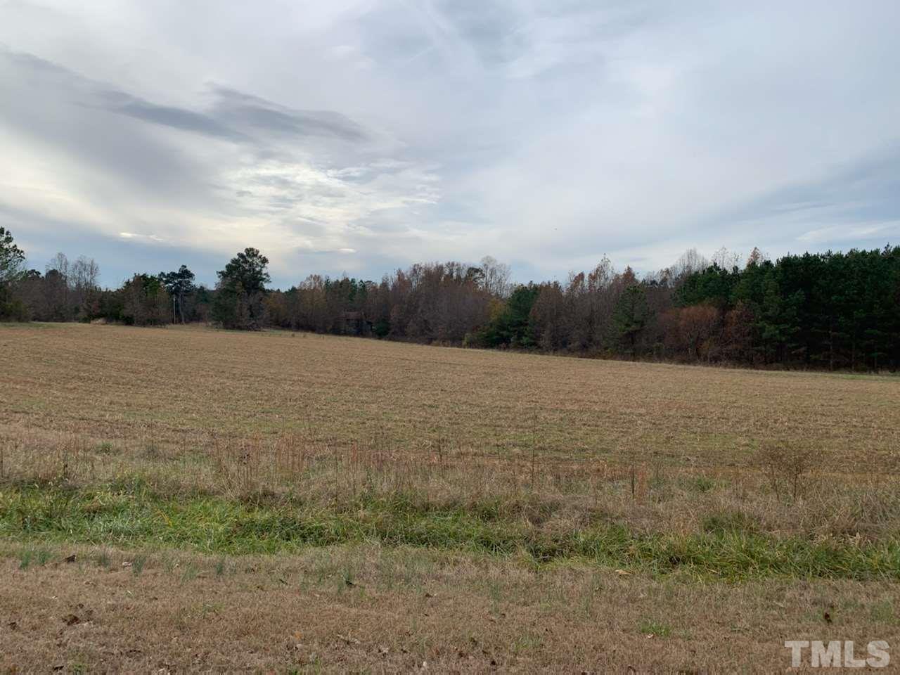 121 Archie Clayton Road Roxboro, NC 27574 - Photo 1 of 8 a view of lake
