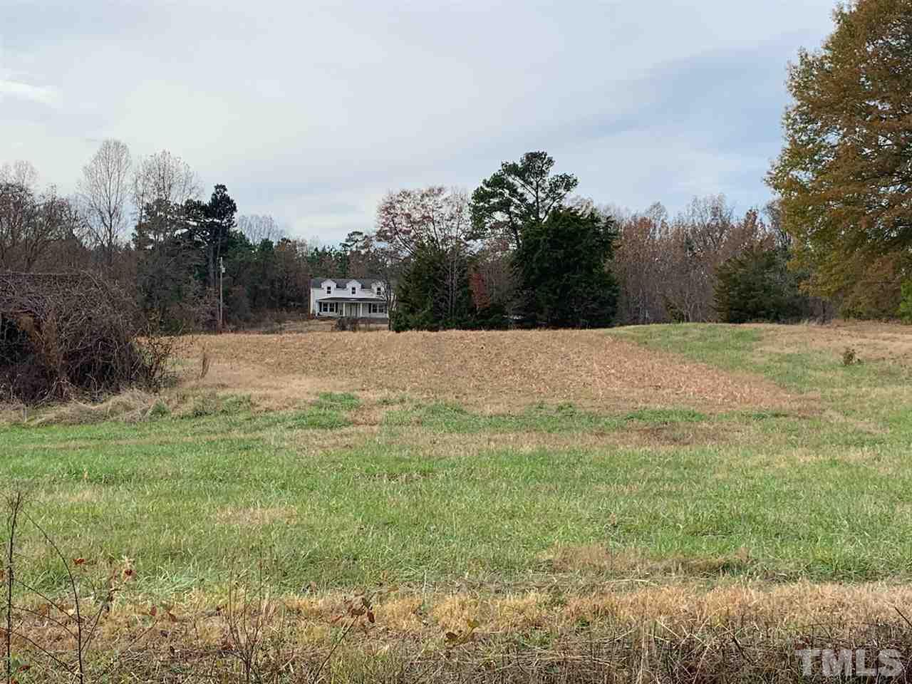 121 Archie Clayton Road Roxboro, NC 27574 - Photo 5 of 8 a view of an outdoor space and a yard