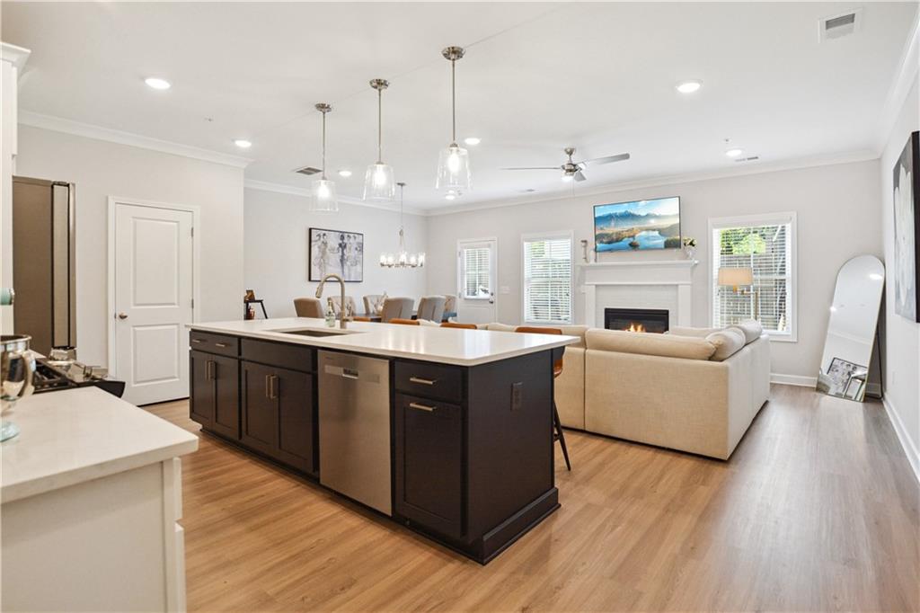 765 Trevett Way Marietta, GA 30066 - Photo 4 of 44 a kitchen with a sink stove and wooden floor