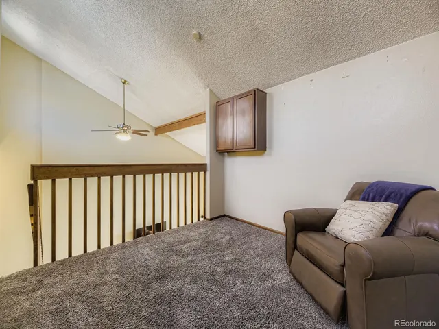 a view of livingroom with furniture and wooden floor