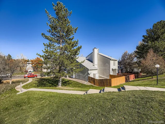 a house view with a garden space