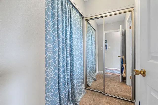 a view of a bathroom with shower