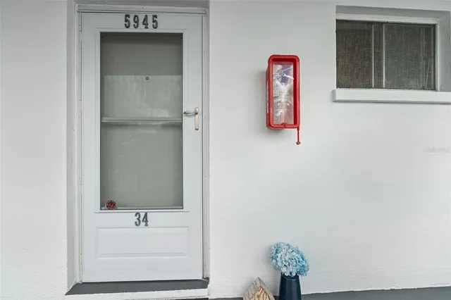 a bathroom with a tub and a sink
