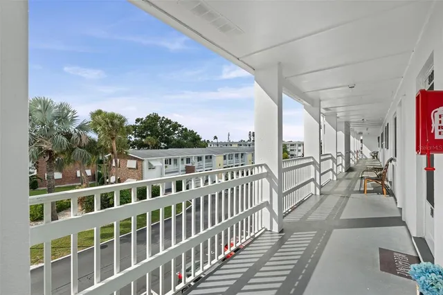 a view of a balcony with city view