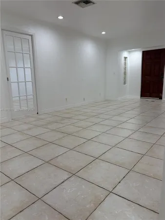 a view of a livingroom with a large window