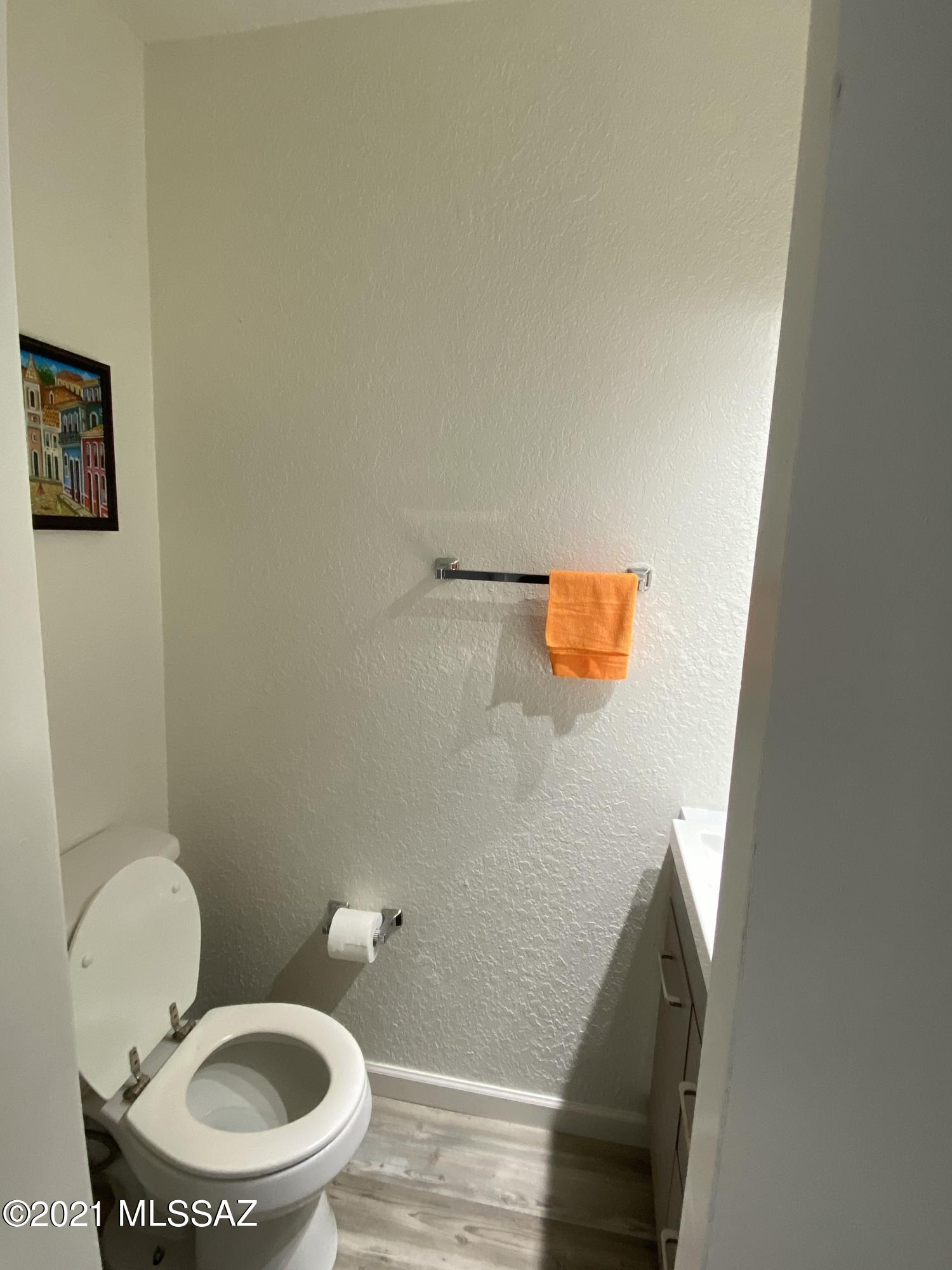 236 East Pastime Road Tucson, AZ 85705 - Photo 12 of 20 a bathroom with a toilet and a shower