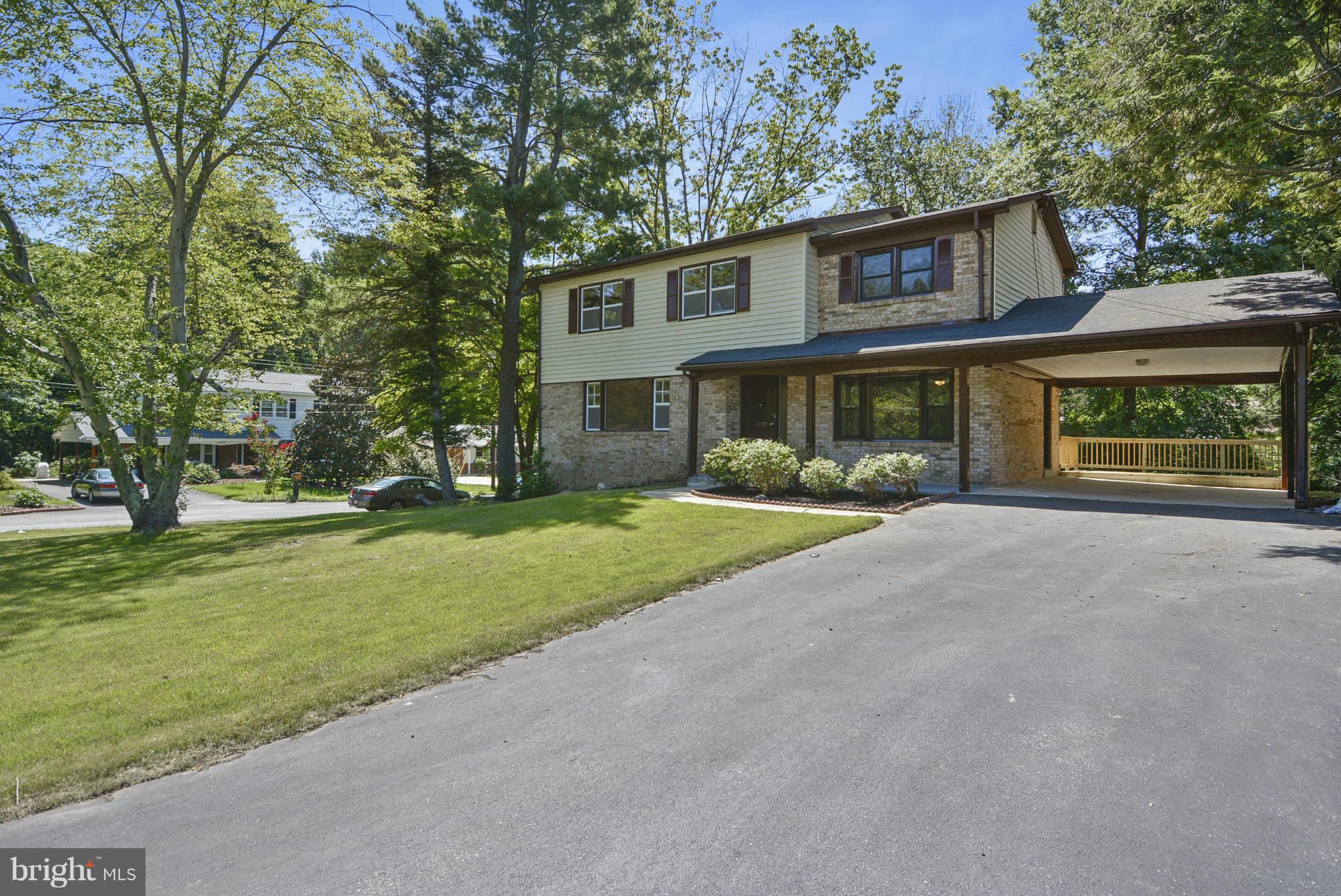 1409 Jackson Road Silver Spring, MD 20904 - Photo 2 of 30 front view of house with a yard